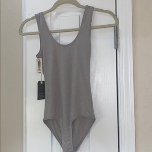 Grey body suit